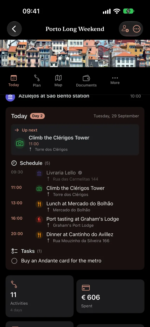 The iPhone app on the second day of a Porto trip: the Clérigos Tower up next at 11:00, the day's five stops, and a task to buy a metro card.